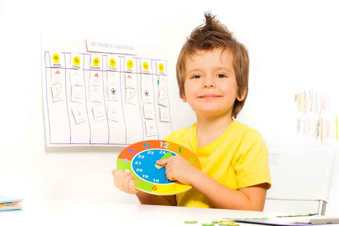 A child with a month planner