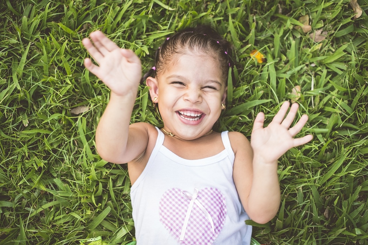 A happy child, smiling.